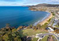 Aerial view of Blackmans Bay beach looking south towards Bruny Island